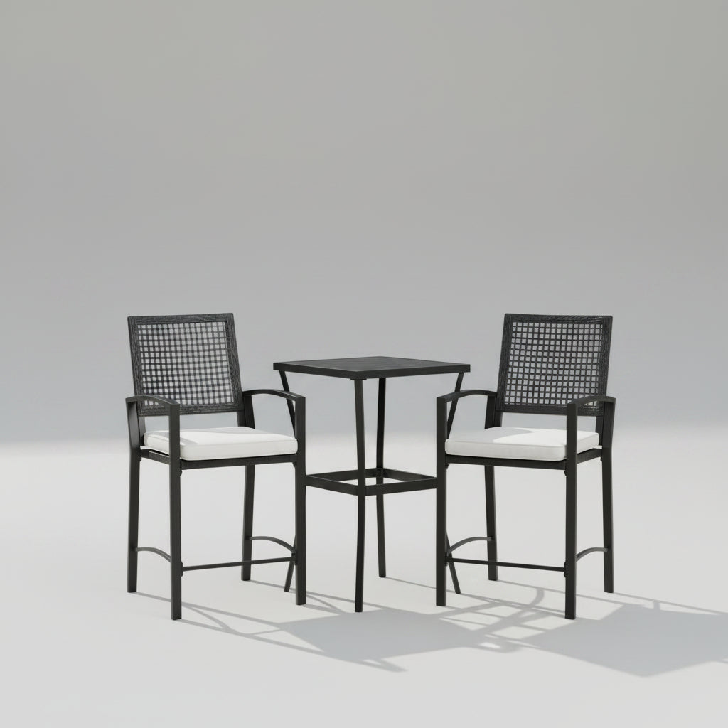 A 3-piece outdoor rattan wicker bar set featuring a high-top table and two cushioned tall armchairs arranged by a poolside deck.