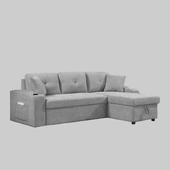 Light grey convertible sectional sofa bed with pulled-out sleeper, armrest storage pockets, and cup holders